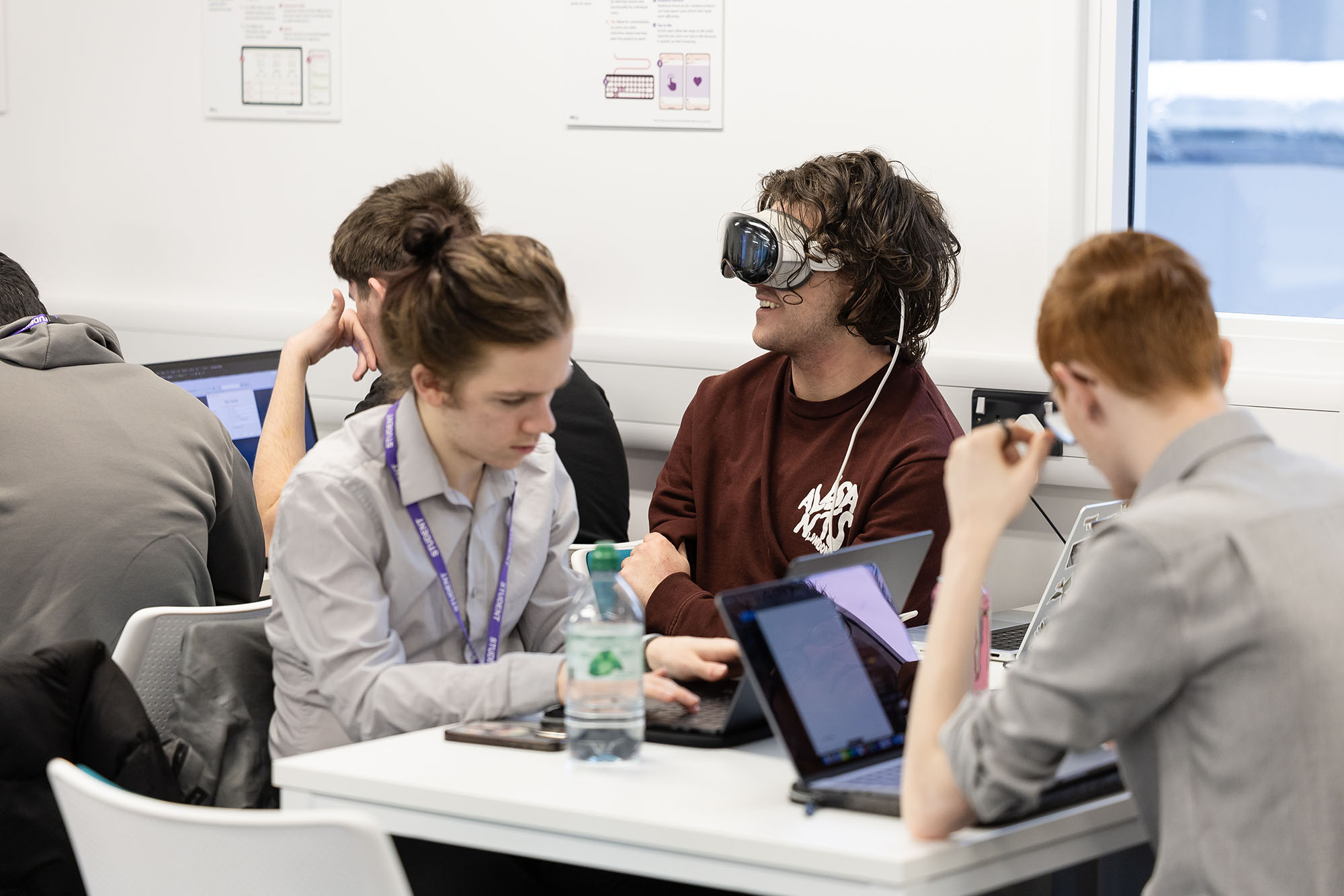 Student wearing a VR headset during a cybersecurity seminar