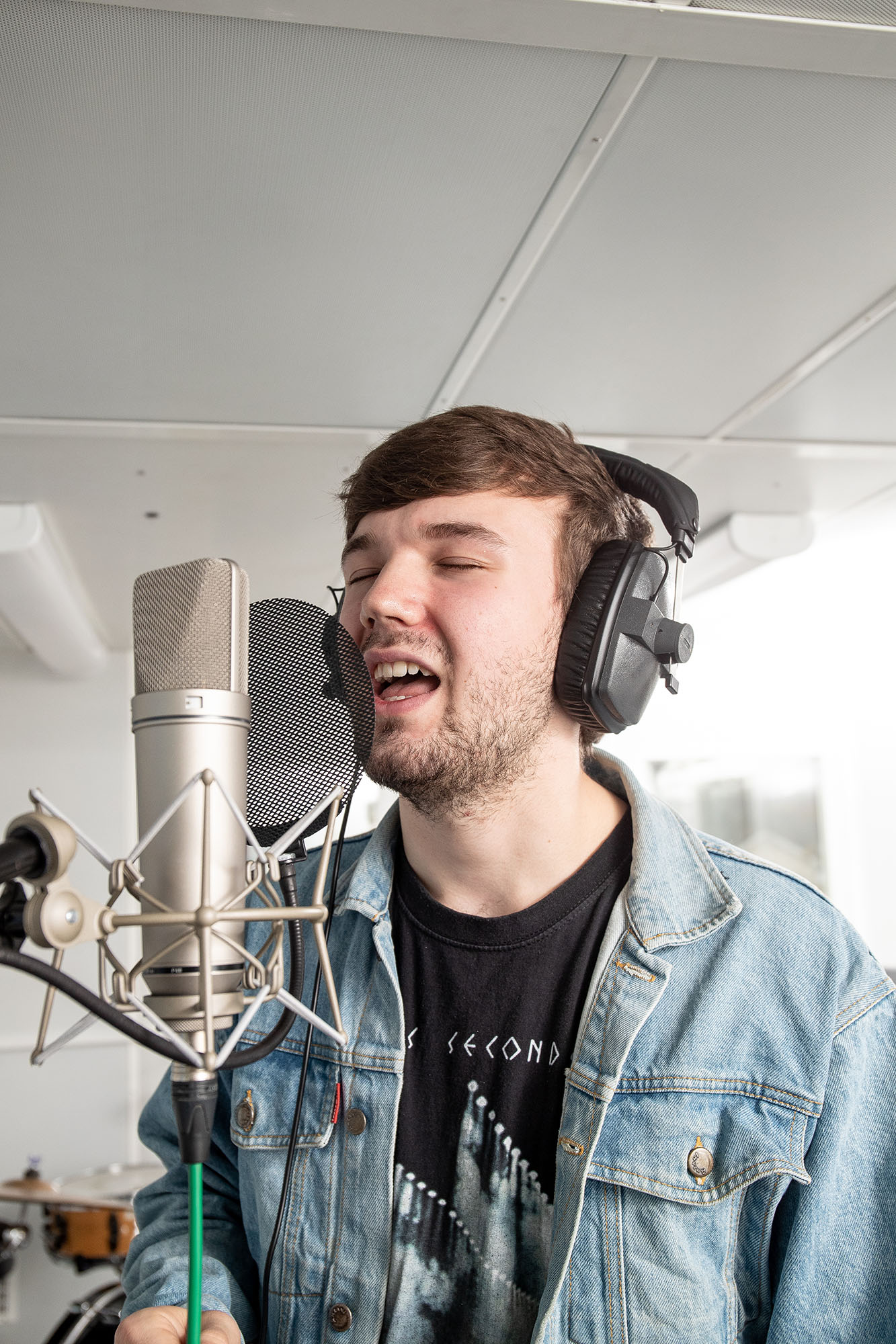 Student singing in performance studio