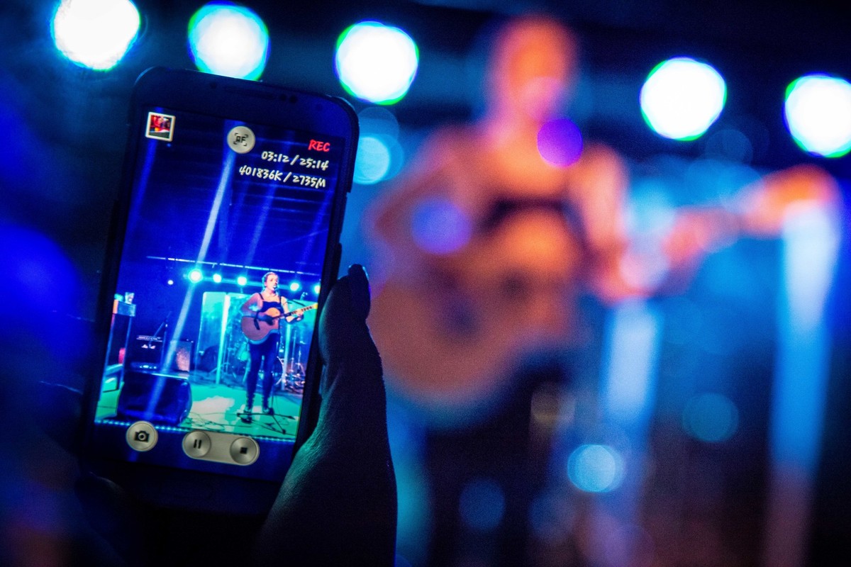 A group of music students performing on stage.